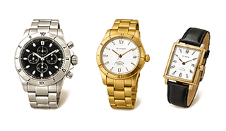 Lineup of three wristwatches: a silver stainless steel chronograph on the left, a gold-tone bracelet watch in the center, and a rectangular white-dial watch with a black leather strap on the right.