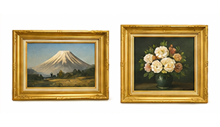 Two gold-framed paintings on a light wall: left shows a snow-capped mountain landscape, right a vase of white roses.